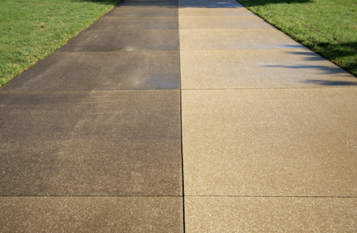Concrete driveway — before and after pressure washing
